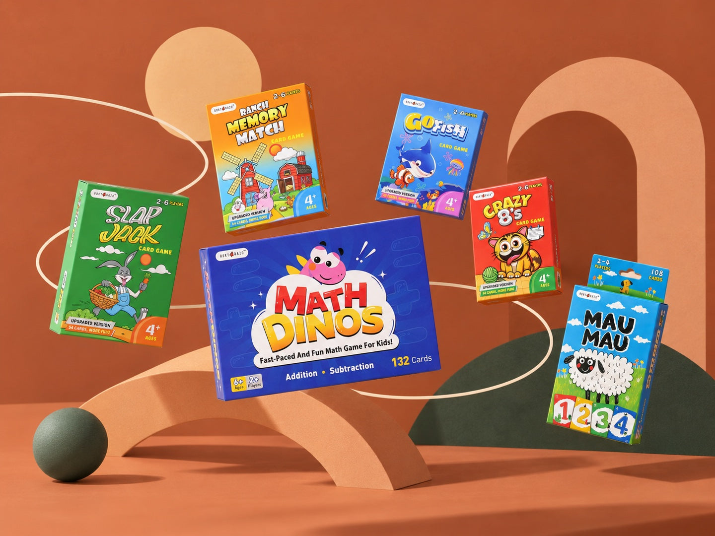A scattered collection of ROKT and RAZO card games against a warm terracotta backdrop